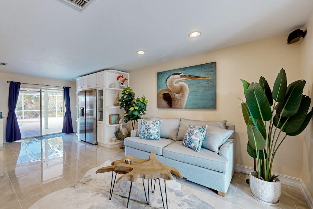 Bright, comfortably furnished living room in a VueStay Southwest Florida vacation rental